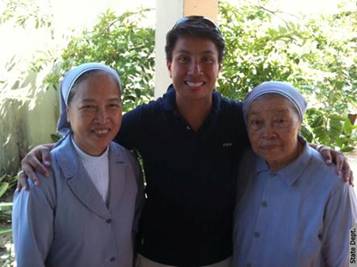 Lieutenant Commander Kim Mitchell with Sister Mary (left) and Sister Vincent in Danang.